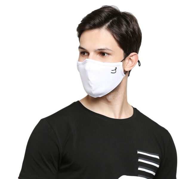 A man wearing light White color reusable Covid killer Mask